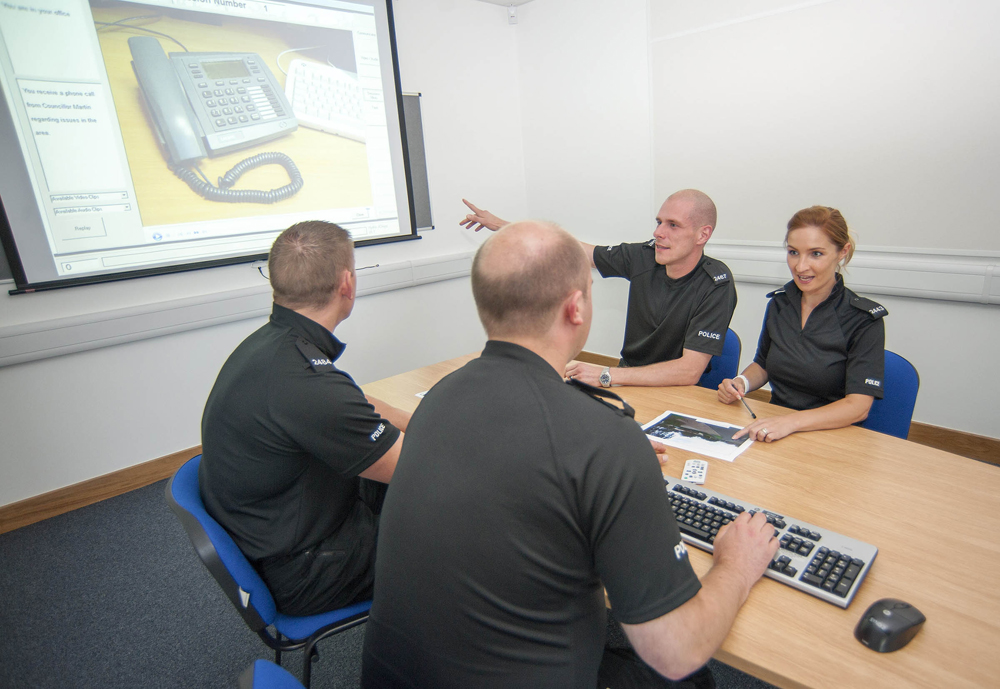 Police participants working through an immersive Hydra simulation